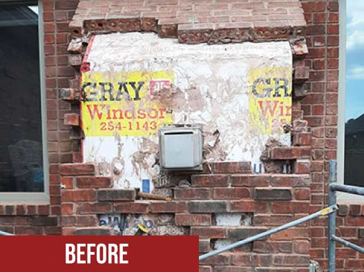 Brick-repair-on-chimney-base-before
